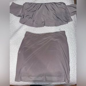 2 piece tan set. Strapless with sleeves. Mint condition.